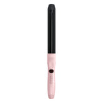 Pink and black hair curler on a white background